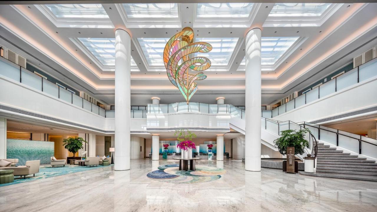 Xiamen International Seaside Hotel -Hotel Corridor Leads To The Stone Exhibition Hall מראה חיצוני תמונה