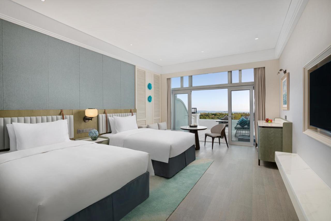 Xiamen International Seaside Hotel -Hotel Corridor Leads To The Stone Exhibition Hall מראה חיצוני תמונה