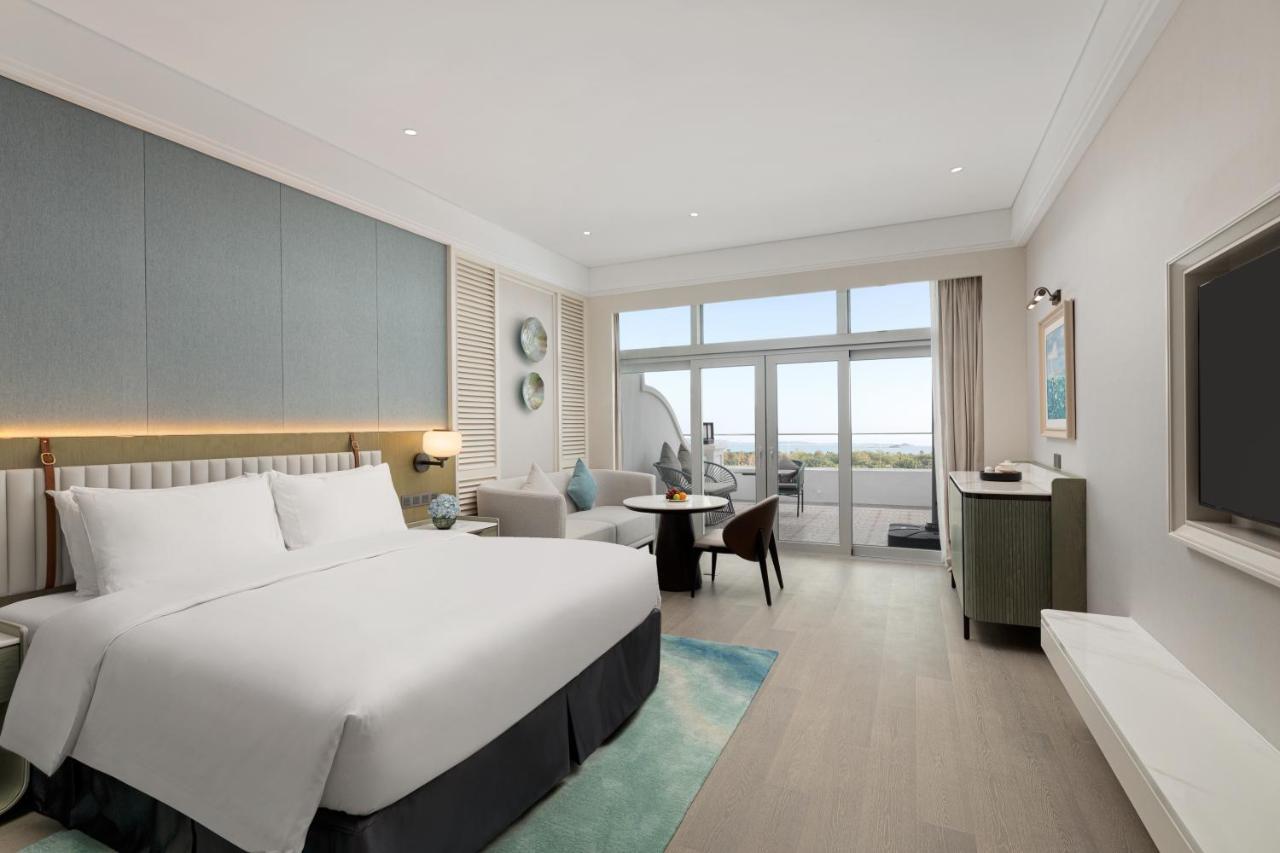 Xiamen International Seaside Hotel -Hotel Corridor Leads To The Stone Exhibition Hall מראה חיצוני תמונה
