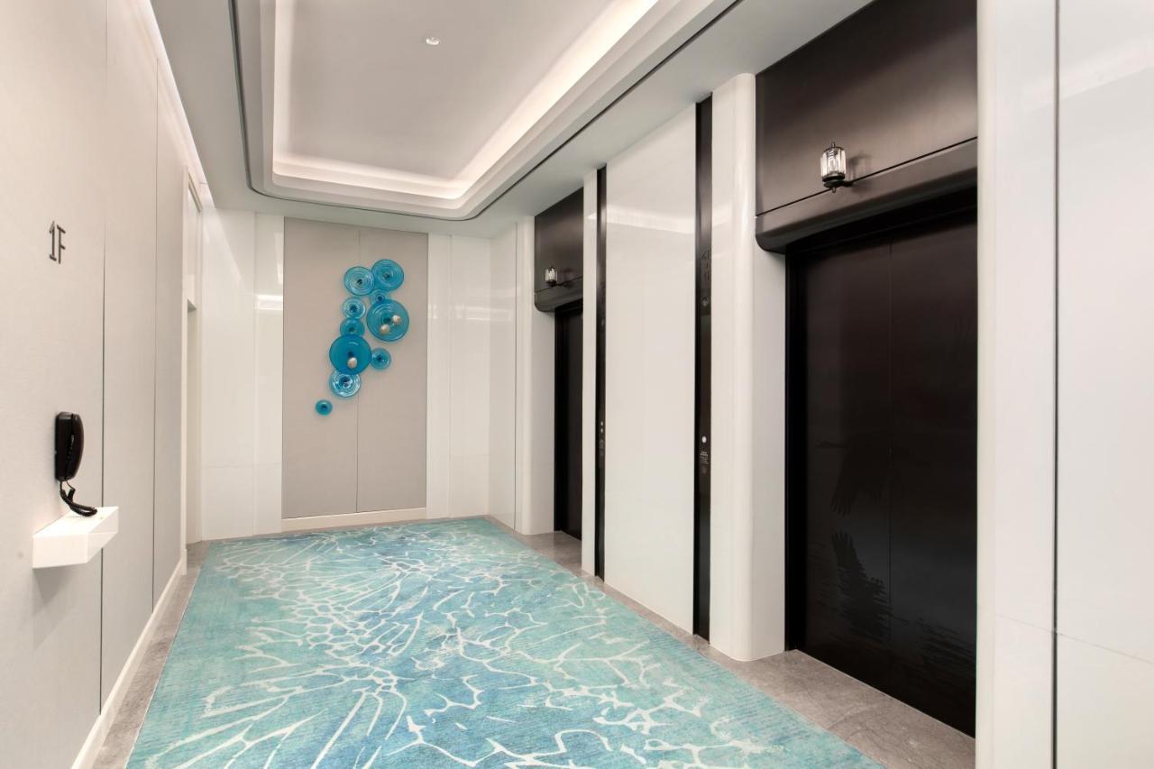 Xiamen International Seaside Hotel -Hotel Corridor Leads To The Stone Exhibition Hall מראה חיצוני תמונה