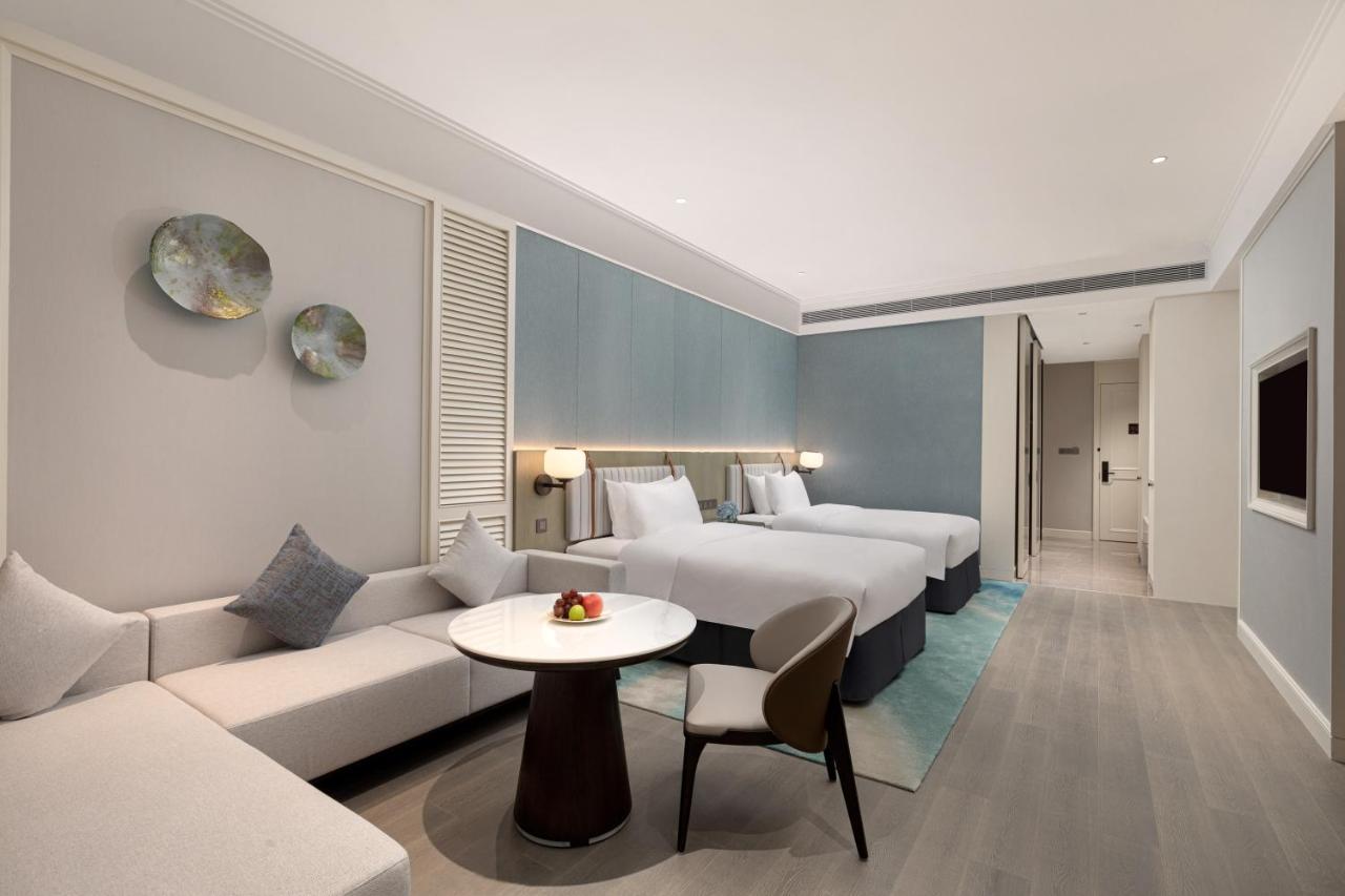 Xiamen International Seaside Hotel -Hotel Corridor Leads To The Stone Exhibition Hall מראה חיצוני תמונה