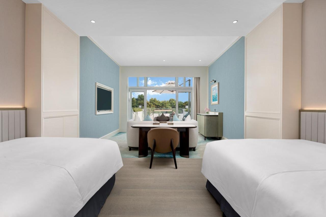 Xiamen International Seaside Hotel -Hotel Corridor Leads To The Stone Exhibition Hall מראה חיצוני תמונה