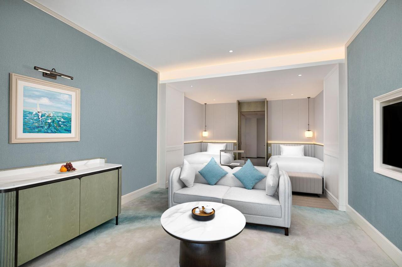 Xiamen International Seaside Hotel -Hotel Corridor Leads To The Stone Exhibition Hall מראה חיצוני תמונה