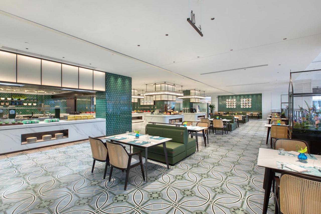Xiamen International Seaside Hotel -Hotel Corridor Leads To The Stone Exhibition Hall מראה חיצוני תמונה